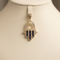 14k Sapphie Hamsa w/ Heart Pendant
